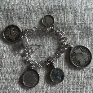 Vintage sterling silver coin charm bracelet